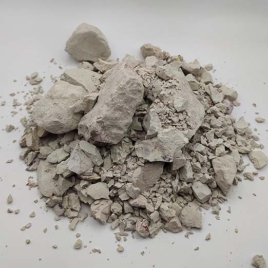 A pile of white kaolinite clay from Libya in a lighting box